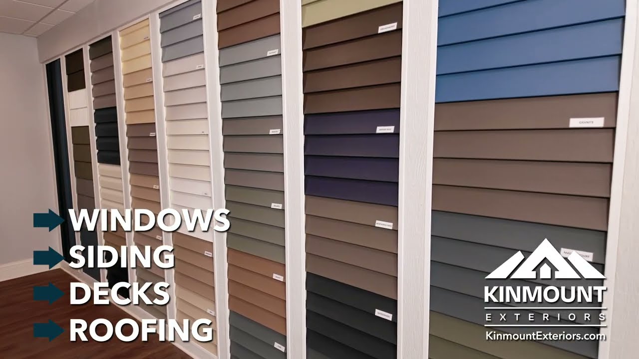 Wall of siding color samples in the Kinmount Exteriors Lakeville showroom.